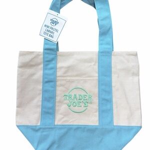 Trader Joe’s mini tote in blue. New with tag Spring release Canvas Tote Bag